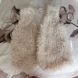 Fluffy white sweater vest